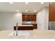 Modern kitchen with island, stainless steel appliances and granite countertops at 9948 Sw 69Th Ln, Ocala, FL 34481