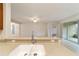 Kitchen features granite countertops, stainless steel appliances, and an island at 9948 Sw 69Th Ln, Ocala, FL 34481