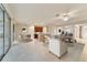 Open concept living room with adjacent kitchen and dining areas at 9948 Sw 69Th Ln, Ocala, FL 34481