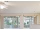 Bright and spacious living area with sliding doors to backyard at 9948 Sw 69Th Ln, Ocala, FL 34481
