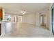 Open concept living room with tile floors and access to patio at 9948 Sw 69Th Ln, Ocala, FL 34481