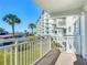 Balcony with view of building, partial water view, and bridge at 100 Silver Beach Ave # 304, Daytona Beach, FL 32118