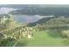 Aerial view showing a peaceful lakeside community at 111 Sw Sycamore Rd, Dunnellon, FL 34431