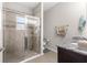 Modern bathroom featuring a walk-in shower, granite countertop, and tile flooring at 11100 Sw 54Th Cir, Ocala, FL 34476