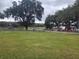 Community park with playground and lake access at 131 Sw Sycamore Rd, Dunnellon, FL 34431