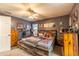 Main bedroom with king-size bed and ample dresser space at 21 Sw Buena Vista Rd, Dunnellon, FL 34431