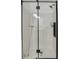 Modern shower with frameless glass enclosure and black accents at 3011 Se 46Th Ave, Ocala, FL 34480