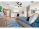 Spacious bedroom with wood-look floors and ceiling fan at 3803 Se 6Th Ave, Ocala, FL 34480
