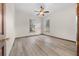 Bright bedroom with wood-look flooring and ceiling fan at 3803 Se 6Th Ave, Ocala, FL 34480