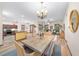 Open dining area with a view of the living room and kitchen at 3803 Se 6Th Ave, Ocala, FL 34480