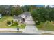 Single-story home with landscaped yard and two-car garage at 3803 Se 6Th Ave, Ocala, FL 34480