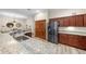 Modern kitchen with stainless steel appliances and granite countertops at 3803 Se 6Th Ave, Ocala, FL 34480