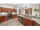 Modern kitchen with stainless steel appliances and granite countertops at 3803 Se 6Th Ave, Ocala, FL 34480