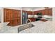 Modern kitchen with stainless steel appliances and granite countertops at 3803 Se 6Th Ave, Ocala, FL 34480