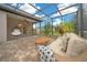 Covered patio with seating area, overlooking backyard at 3803 Se 6Th Ave, Ocala, FL 34480