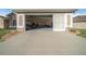 Open garage with storage shelving and tools at 5065 Nw 21St Loop, Ocala, FL 34482