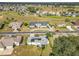Aerial view of a residential neighborhood with houses and a golf course at 5226 Nw 21St Loop, Ocala, FL 34482