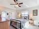 Spacious bedroom with ceiling fan and en-suite bathroom at 5226 Nw 21St Loop, Ocala, FL 34482
