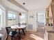 Kitchen nook with round wooden table and view to backyard at 5226 Nw 21St Loop, Ocala, FL 34482