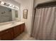 Clean bathroom with vanity, sink, and shower at 7289 Hemlock Rd, Ocala, FL 34472