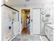 Spacious bathroom featuring double vanity sinks, a walk-in shower, and a soaking tub at 8327 Sw 79Th Cir, Ocala, FL 34476