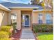 Welcoming front entry with covered porch and decorative walkway at 8327 Sw 79Th Cir, Ocala, FL 34476