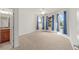 Bright bedroom with bay window and carpet at 9733 Sw 74Th Pl, Ocala, FL 34481