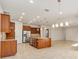 Open kitchen with large island and stainless steel appliances at 9733 Sw 74Th Pl, Ocala, FL 34481