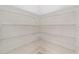 Spacious pantry with ample shelving for storage at 9733 Sw 74Th Pl, Ocala, FL 34481