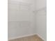 Spacious walk-in closet with wire shelving at 9733 Sw 74Th Pl, Ocala, FL 34481