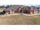 One-story home with tile roof, stone accents, and a large yard at 9901 Nw 6Th Ct, Ocala, FL 34475