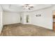 Large bedroom with plush carpet and access to backyard at 9901 Nw 6Th Ct, Ocala, FL 34475