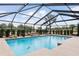 Large screened pool with ample deck space at 9901 Nw 6Th Ct, Ocala, FL 34475