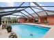 Inviting screened pool with spacious patio area at 9901 Nw 6Th Ct, Ocala, FL 34475