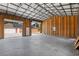 Spacious interior of a large unfinished workshop at 9901 Nw 6Th Ct, Ocala, FL 34475