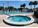 Relaxing spa tub adjacent to the community pool at 11495 Sw 138Th Ln, Dunnellon, FL 34432