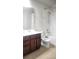 Clean bathroom with tub, shower, and double vanity at 1609 Chelsea Manor Cir, Deland, FL 32724