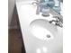 Modern bathroom vanity with double sinks and white countertop at 1609 Chelsea Manor Cir, Deland, FL 32724