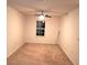 Spacious bedroom with ceiling fan and neutral carpet at 1609 Chelsea Manor Cir, Deland, FL 32724