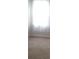 Bright bedroom with large window and neutral carpet at 1609 Chelsea Manor Cir, Deland, FL 32724