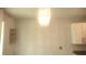 Dining area with overhead lighting and a wall-mounted shelf at 1609 Chelsea Manor Cir, Deland, FL 32724
