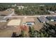 Aerial view of house with pool and surrounding homes at 17196 Sw 44Th Cir, Ocala, FL 34473