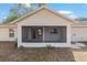 Spacious screened porch with double doors at 1815 Ne 39Th St, Ocala, FL 34479