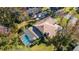 Aerial view of house with pool and landscaped yard at 1825 Se 36Th Pl, Ocala, FL 34471