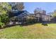 Spacious backyard with a screened pool at 1825 Se 36Th Pl, Ocala, FL 34471