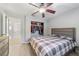 Spacious bedroom with a large closet and ceiling fan at 1825 Se 36Th Pl, Ocala, FL 34471