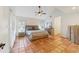 Spacious bedroom with tile floors and a ceiling fan at 1825 Se 36Th Pl, Ocala, FL 34471