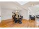 Elegant dining room with hardwood floors and glass table at 1825 Se 36Th Pl, Ocala, FL 34471