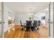 Spacious dining room with hardwood floors and access to the kitchen at 1825 Se 36Th Pl, Ocala, FL 34471