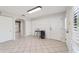 Bright entry hall with tile flooring and staircase leading to the upper level at 1825 Se 36Th Pl, Ocala, FL 34471